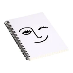 DENY Designs Wink Face By Mambo Art Studio Notebook, 5.5" X 8.25", Dotted, 40 Sheets, White/Black (68797-nobs01)